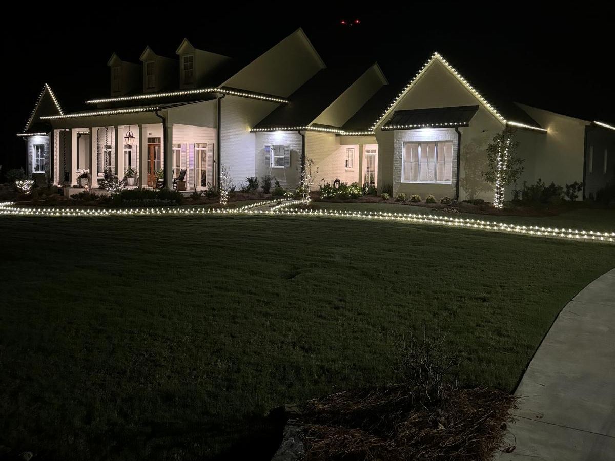 Superscapes Christmas roofline lighting on a farmhouse