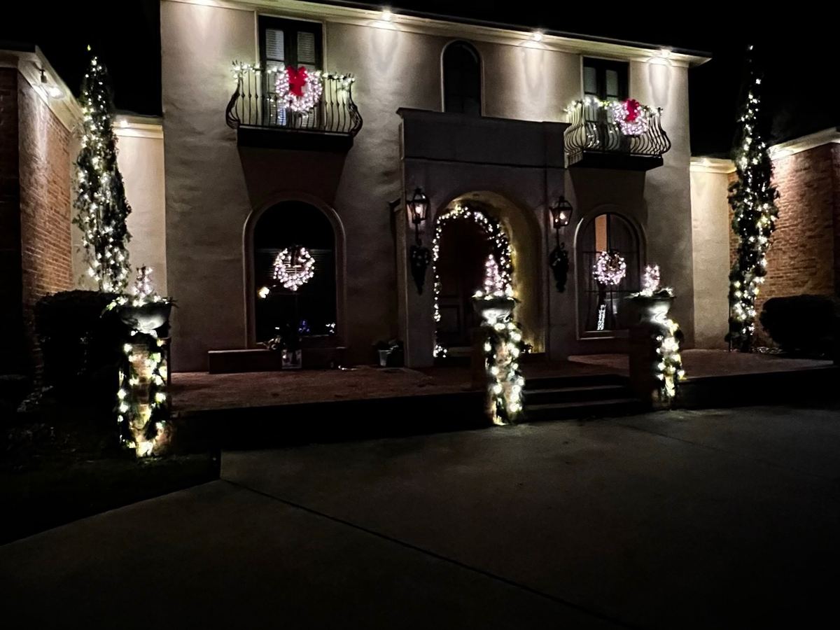 Superscapes Christmas lighting on a two-story home